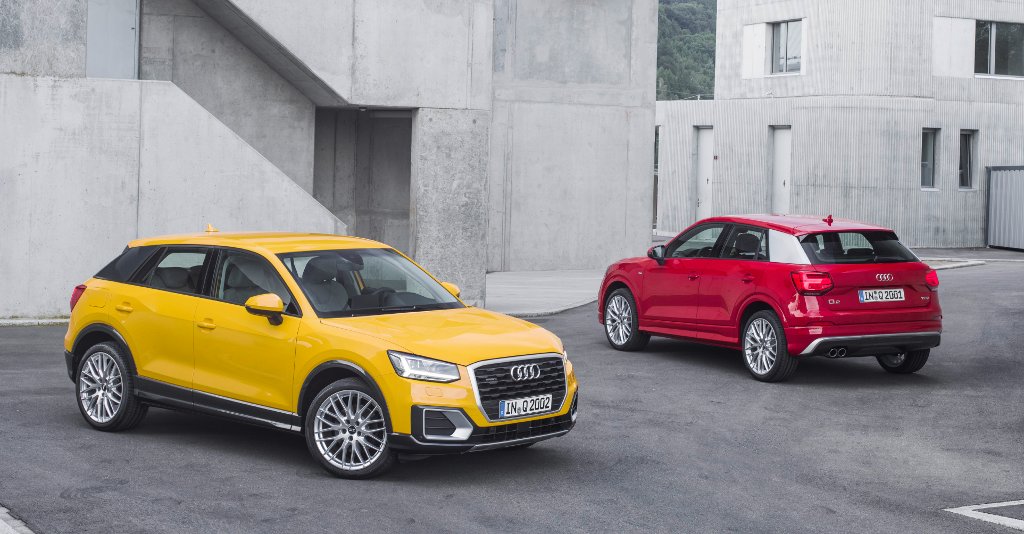 Audi Q2 rouge et jaune - vue de trois quart avant
